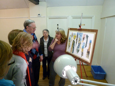 Picture of Denise Allen and members of Marlow Art and Crafts Society discussing her picture in the tea break