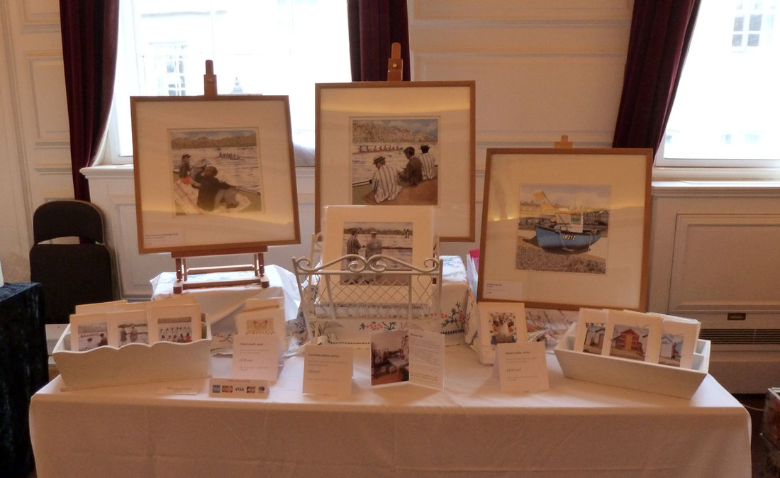 Picture of my table display at the Windsor Emporium showing origianl artworks, prints and cards.
